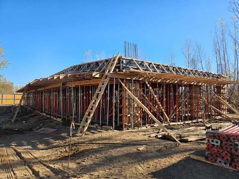 Timber formwork with props for the pour of a ground floor slab