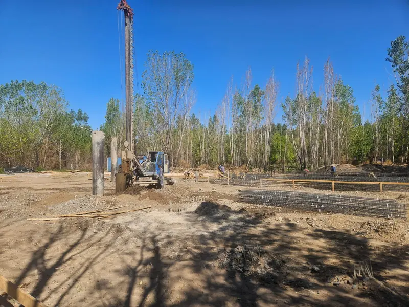 Piling rig installing deep foundations on the site