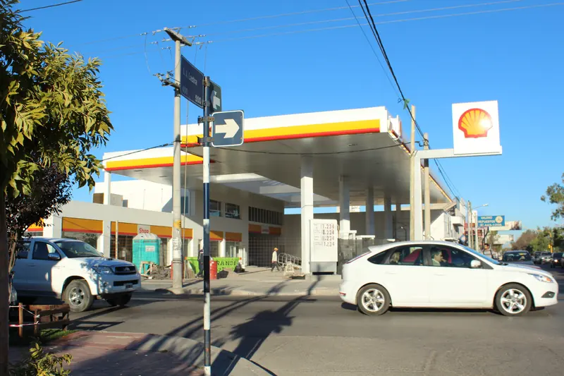 Completed Shell service station with canopied forecourt, pumps and shop