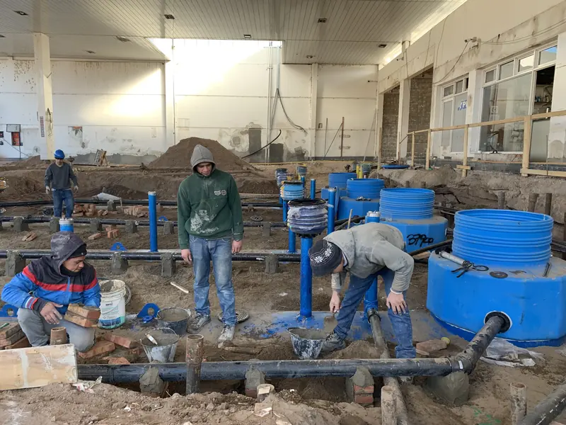 Fuel pipework and containment sumps being installed inside the building