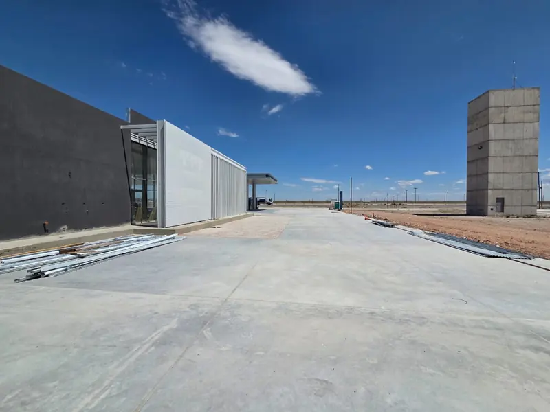 Completed shop next to the concrete water tower